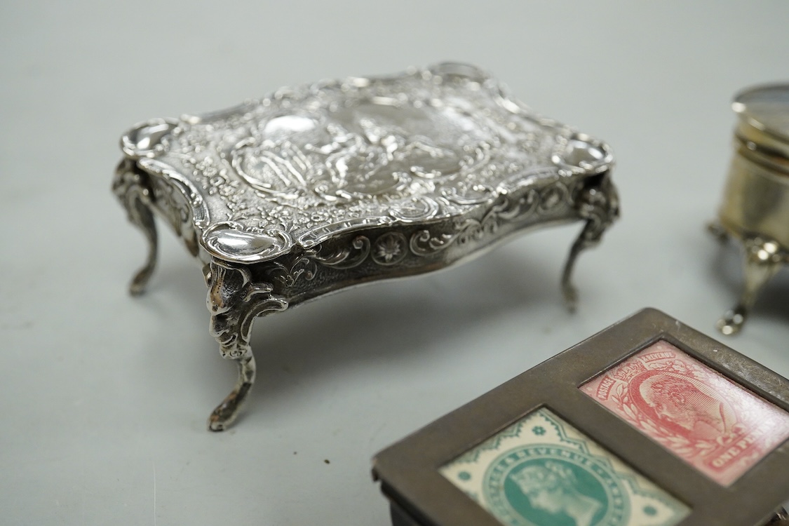 A George V silver mounted oval trinket box, Clark & Sewell, Chester, 1924, 65mm, together with a small silver circular pill box and cover, a 925 double stamp box, and a late Victorian continental silver miniature model o
